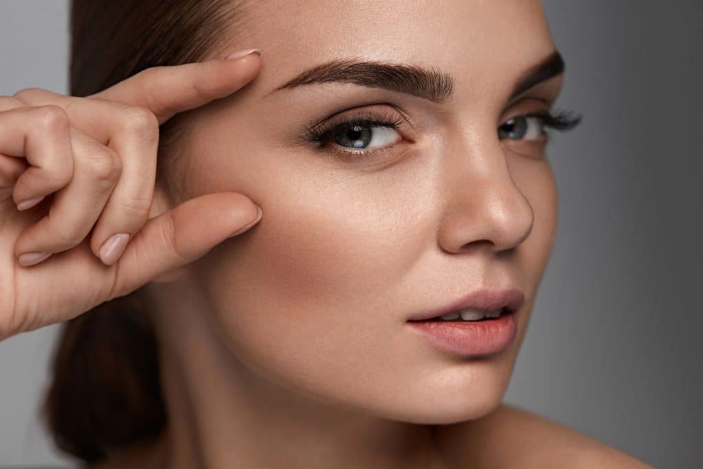 Beautiful Woman With Beauty Face, Professional Makeup. Skin Care Botox